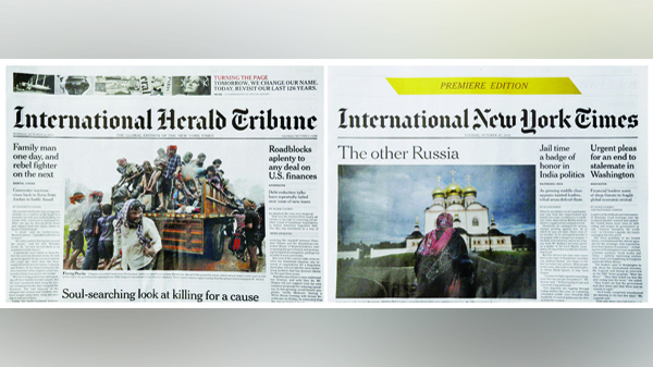 Ostatnia edycja The International Herald Tribune z 14 października oraz pierwsza edycja New York Times International fot. Narong Sangnak/PAP/EPA