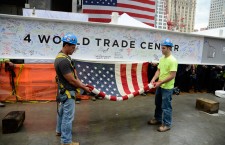 The Final Steel beam is lifted to the top of 4 World Trade Center