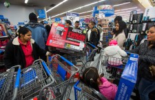 Black Friday Shoppers Line Up on Thanksgiving Day