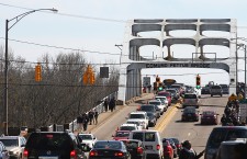 Commemorating the 50th anniversary of Bloody Sunday crossing of the Edmund Pettus Bridge in Selma, Alabama, USA